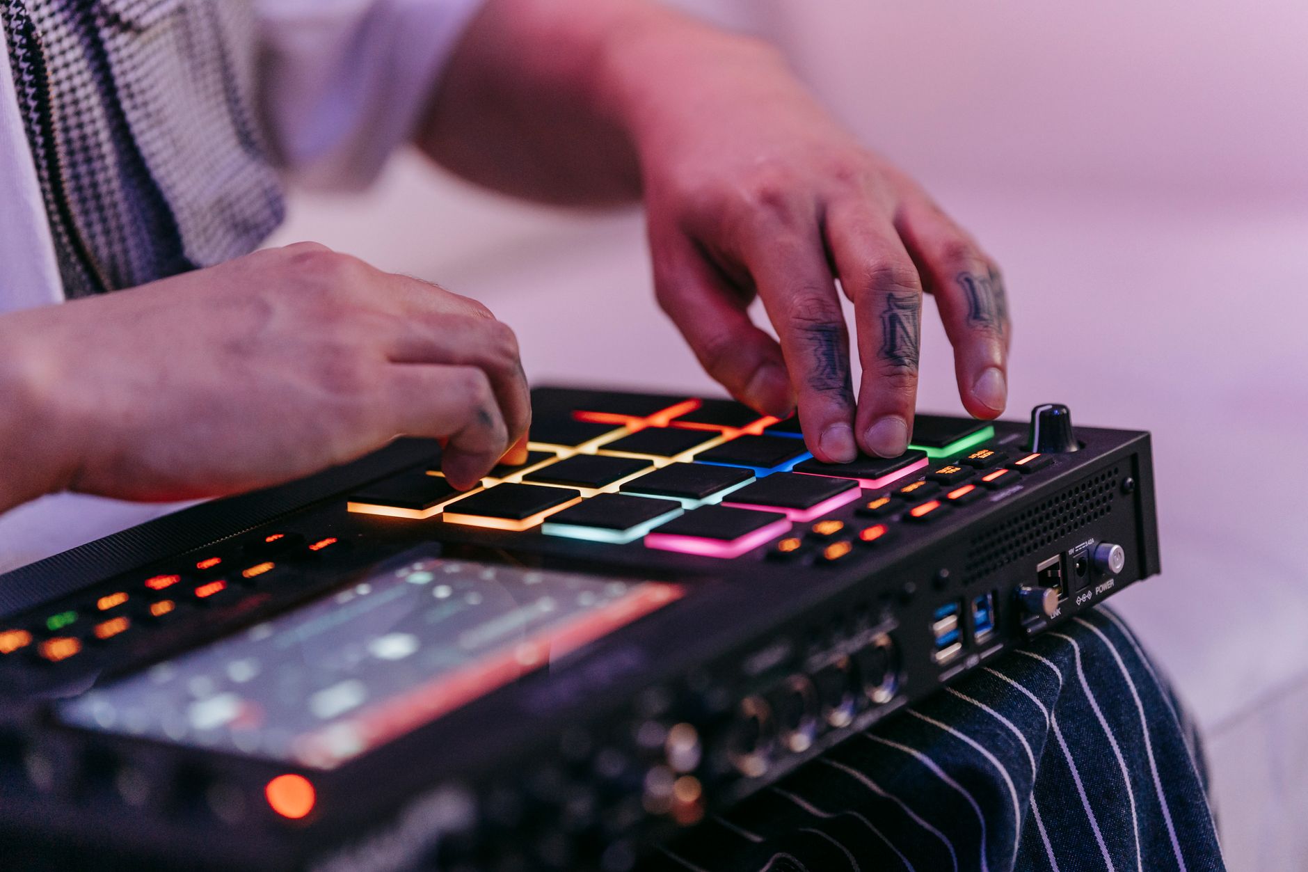 Hands On Settings Producer adjusting controller settings for sidechain and mix balance