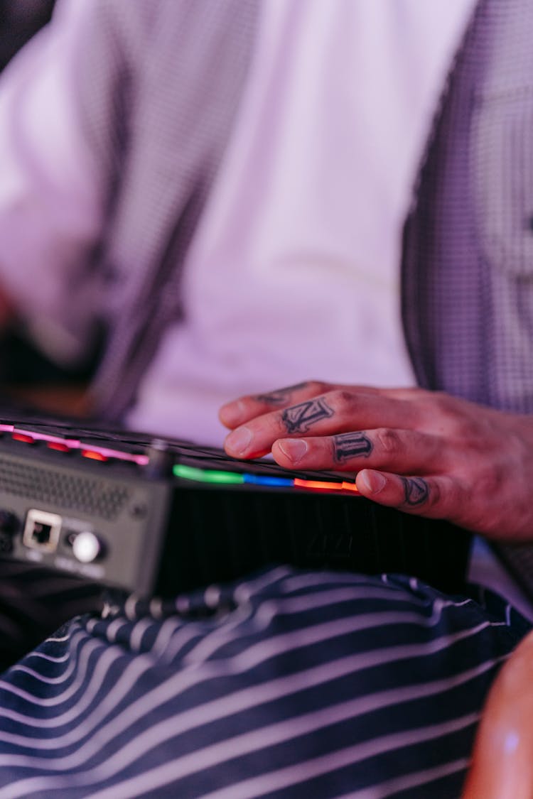 A Person Using A Music Sequencer