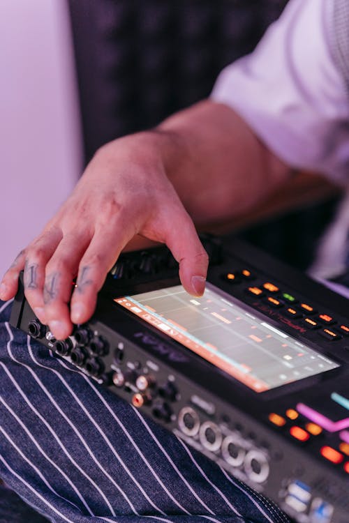 A Person Using a Music Sequencer