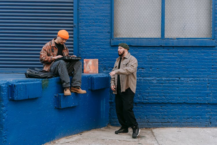 Men Making Music On Street