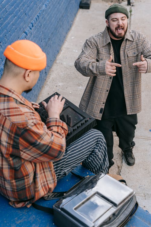 Men Creating Music Outdoors