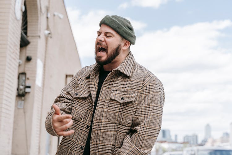 Man Singing On Street