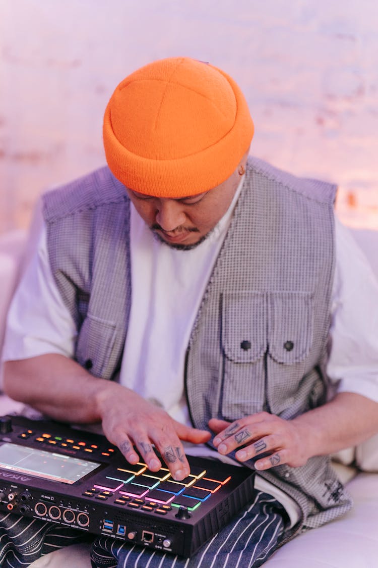 Man In An Orange Hat Mixing Sound