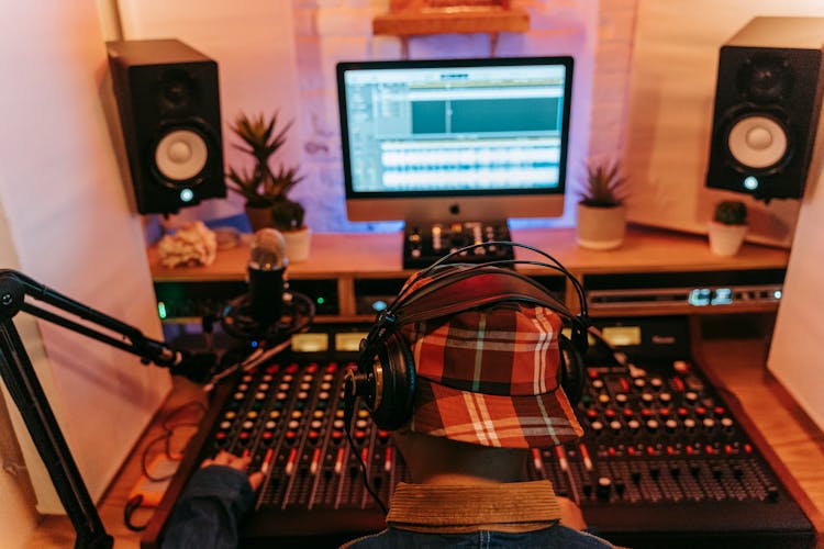 An Audio Engineer In A Recording Studio