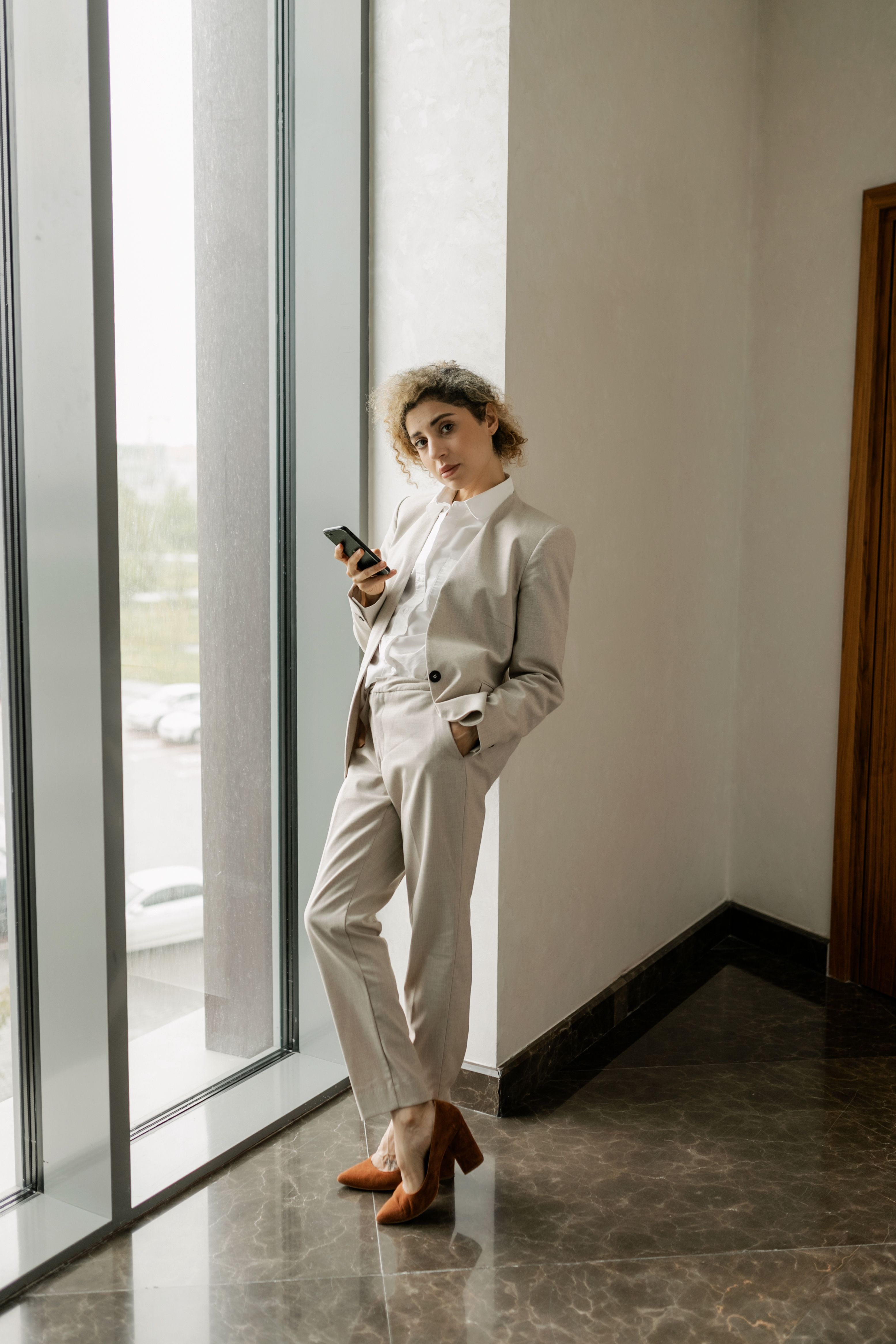 A Woman Looking Out the Window · Free Stock Photo