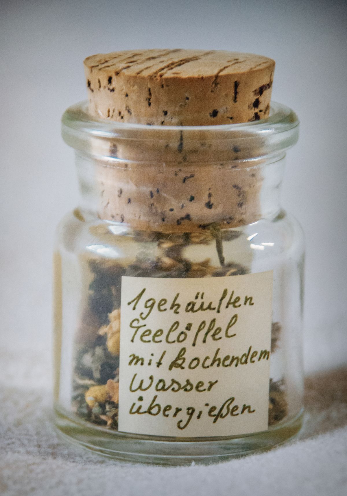 Christmas advent calendar ideas with paper notes inside a clear glass jar