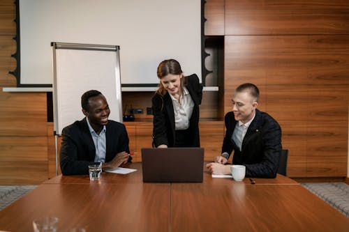 Free People Wearing Corporate Attire Having Meeting at the Office Stock Photo