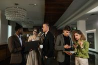 Group of People Standing Inside Room