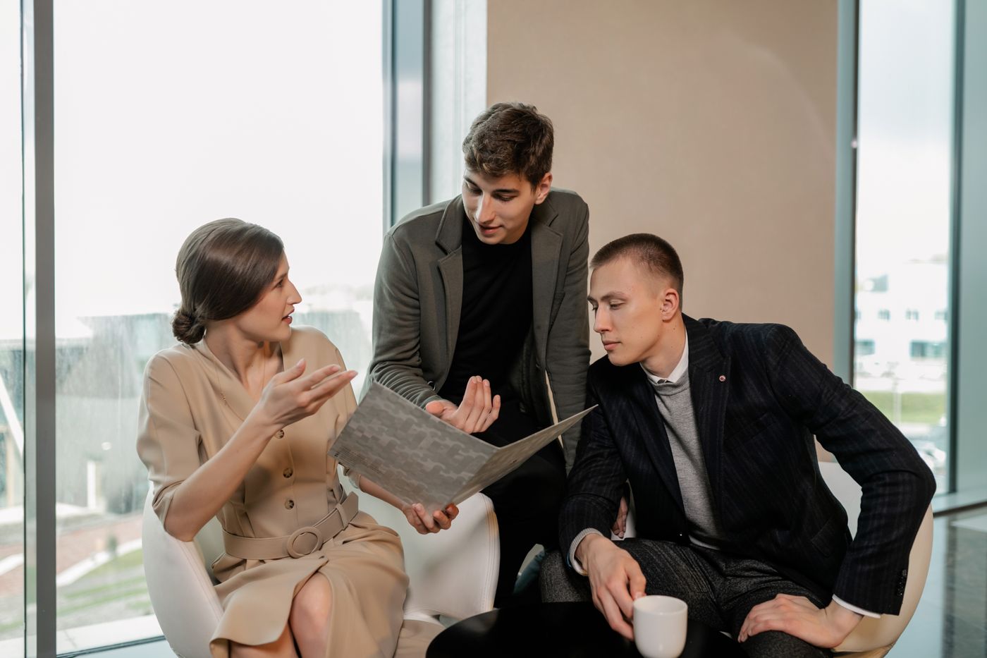 Professionals having an engaged face-to-face conversation