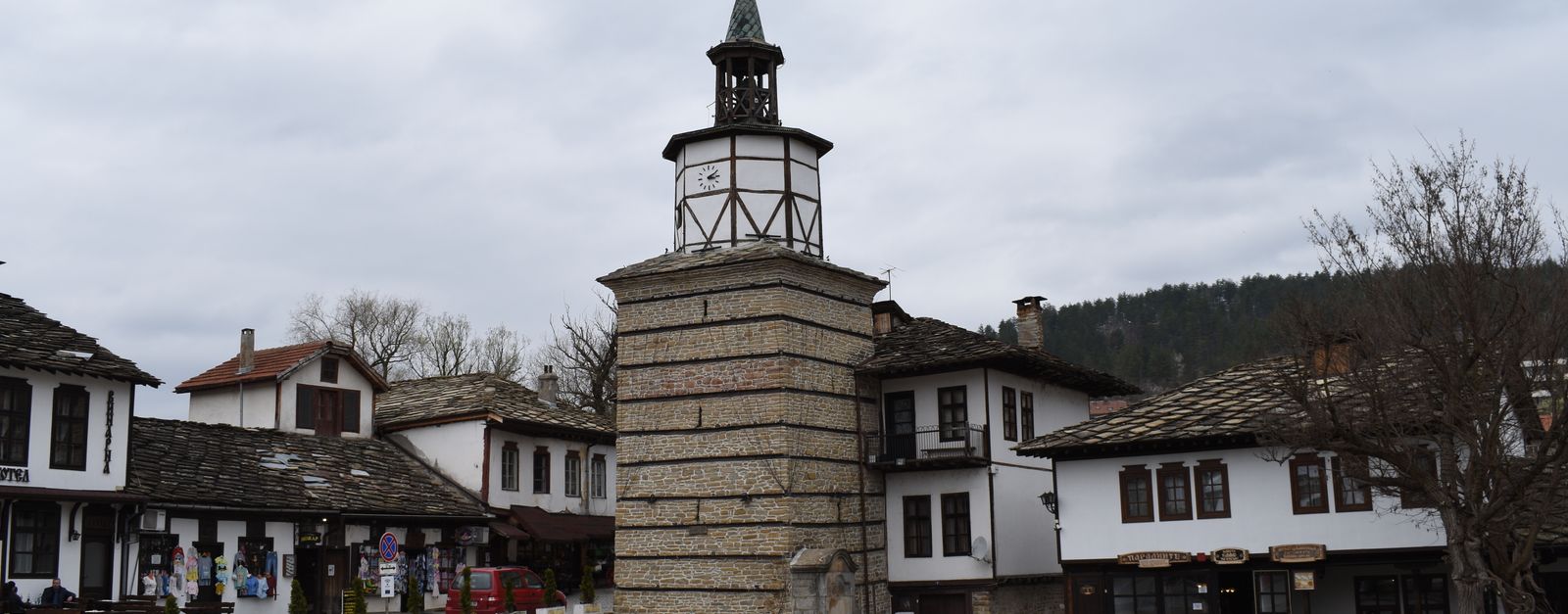 Scenic view of the Tryavna Clock Tower in Gabrovo, Bulgaria on a cloudy day.