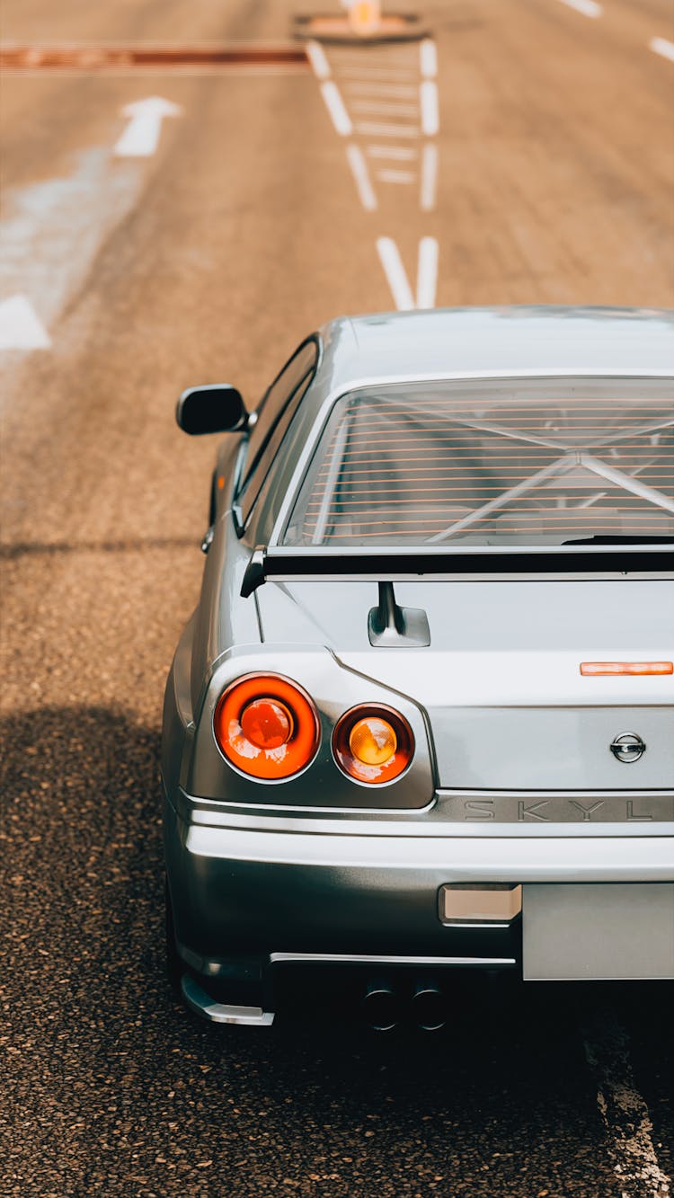 Silver Nissan Skyline On Road