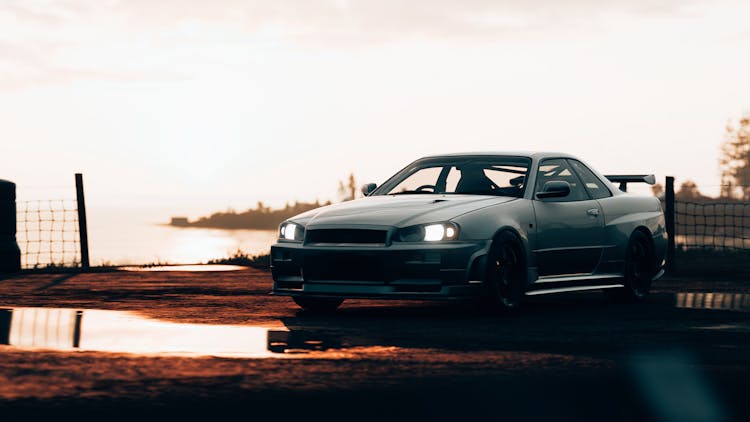 Photo Of A Nissan Skyline Parked Near Body Of Water