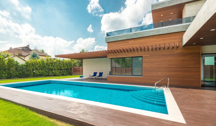 Backyard Swimming Pool Under Blue Sky