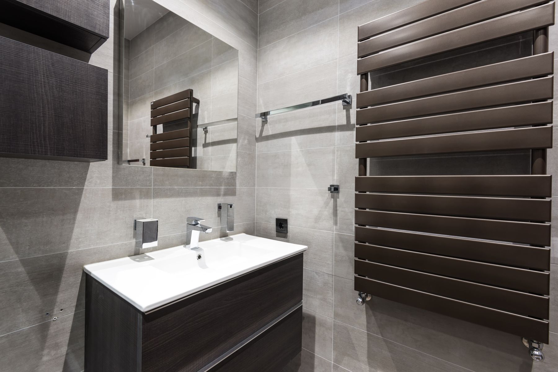 Minimal bathroom sink with black and white contrast