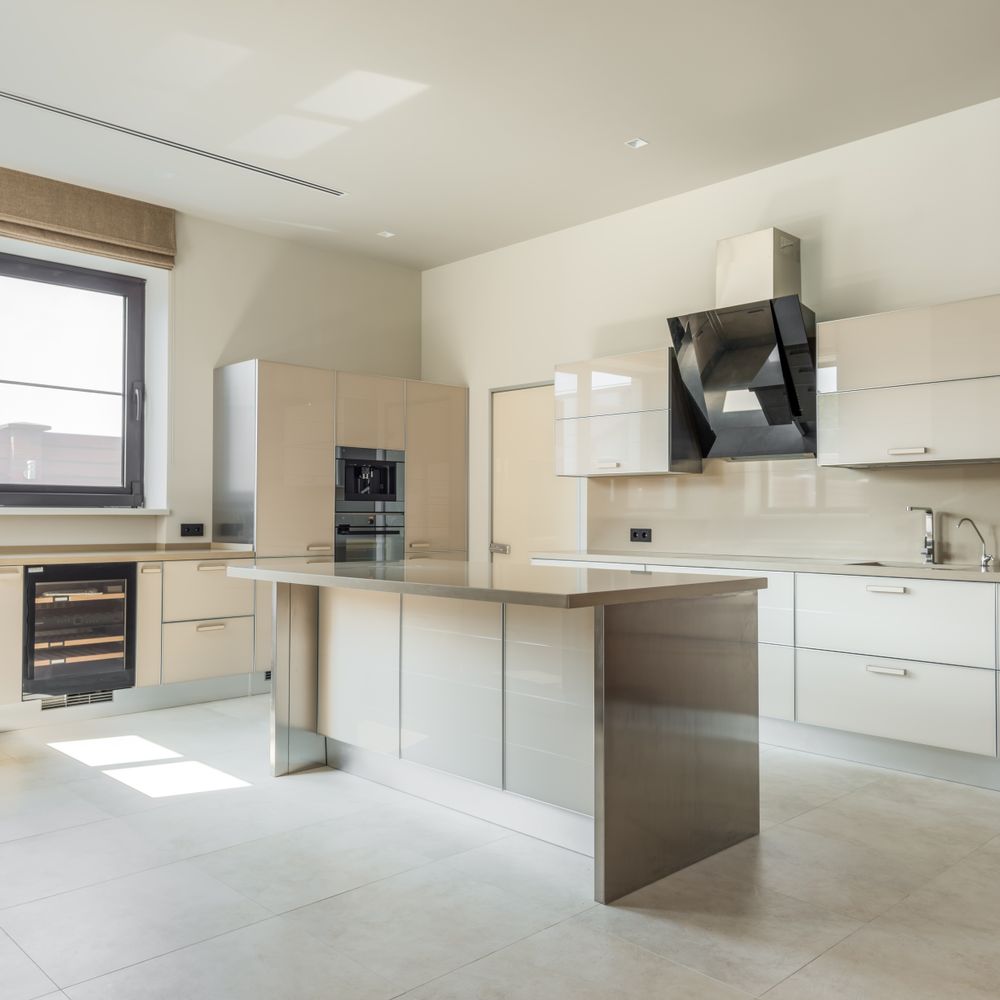 Kitchen Spraying in Oval — clean edges cut in around trim and sockets