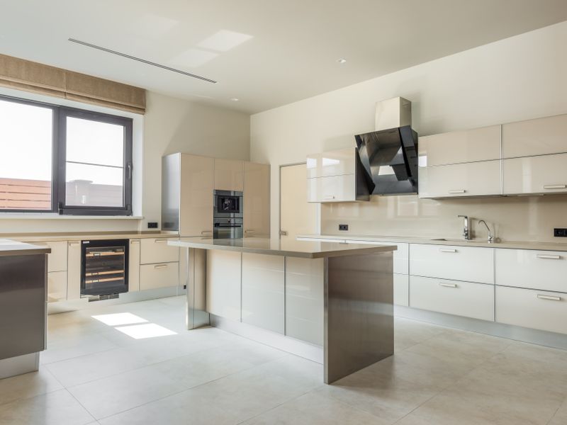 A kitchen renovation with new cabinets and worktop