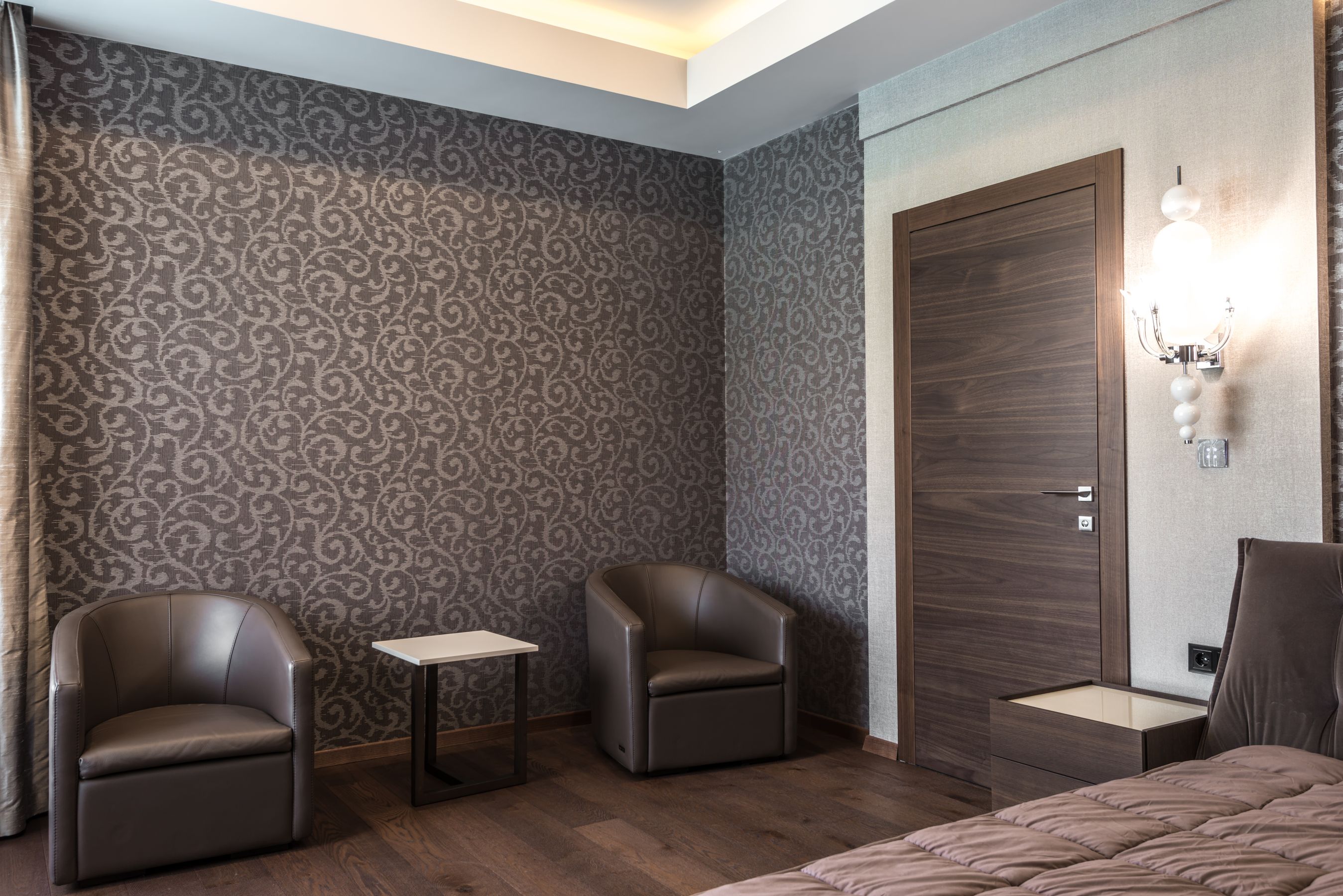 Best boutique hotels in Geneva — luxurious modern hotel room interior with stylish decor