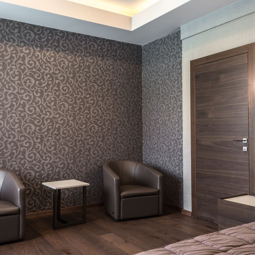 Wallpapering in Plaistow — surfaces prepped and cut in by hand