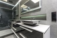 Stainless Steel Faucet on White Ceramic Sink