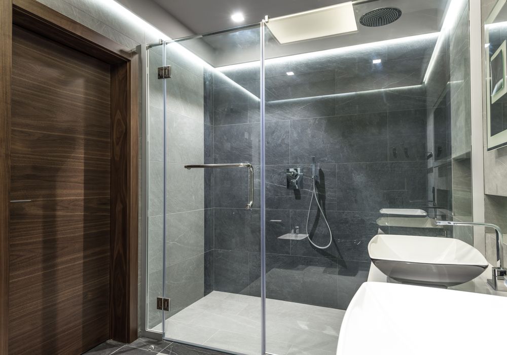 Tub to walk-in shower conversion in a Riverside bathroom