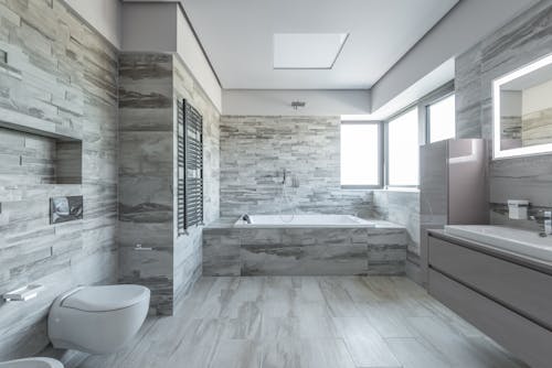 Free Gray and White Tiled Bathroom Stock Photo