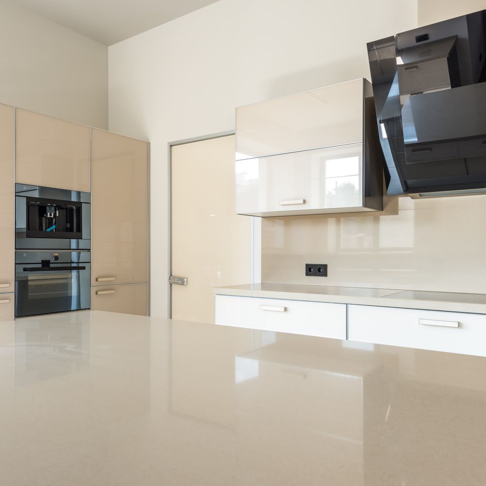 Kitchen Spraying in North End — careful masking before painting begins
