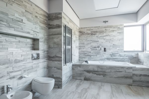 Modern bathroom with large format tile floor