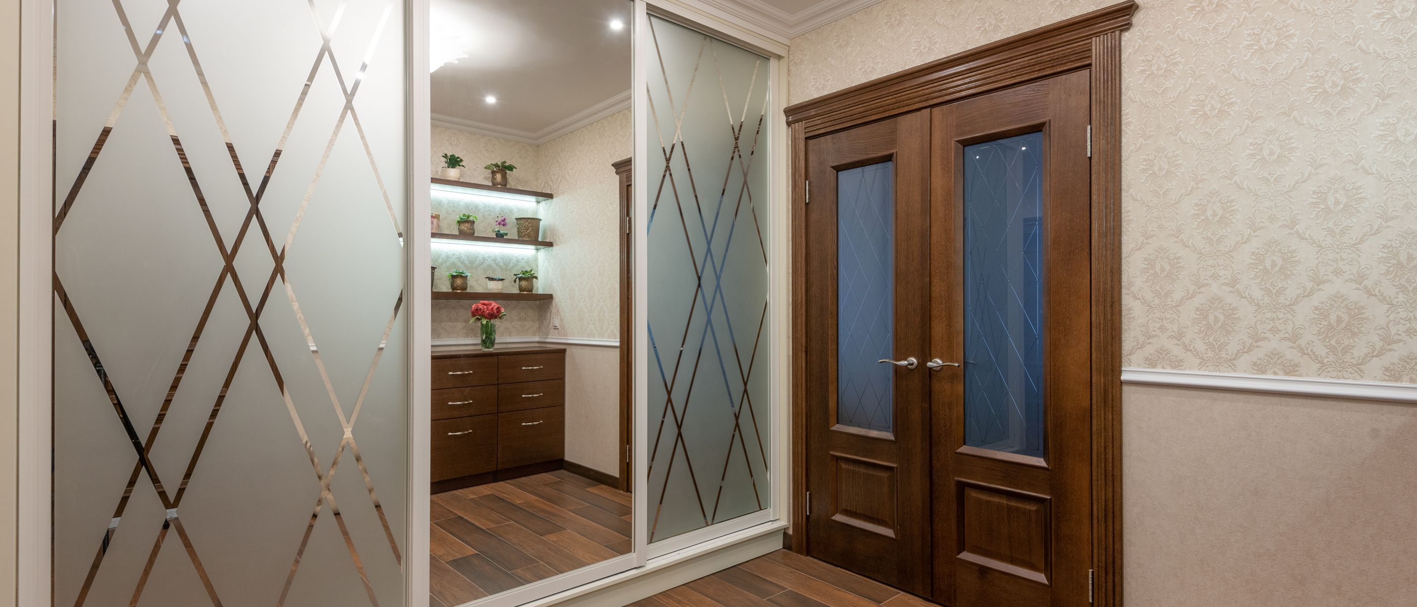 Wallpapering in Acton — clean edges cut in around trim and sockets