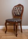 Brown Wooden Framed Gray Padded Chair