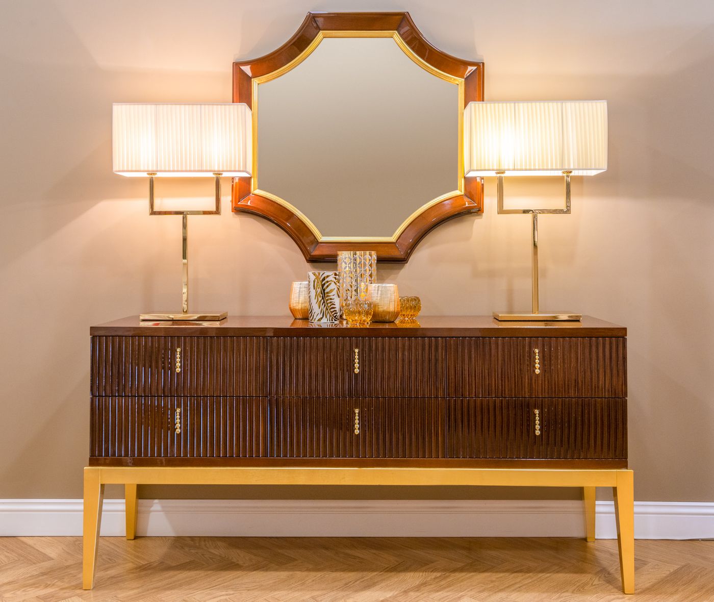 Walnut and brass cabinet with lamps and mirror