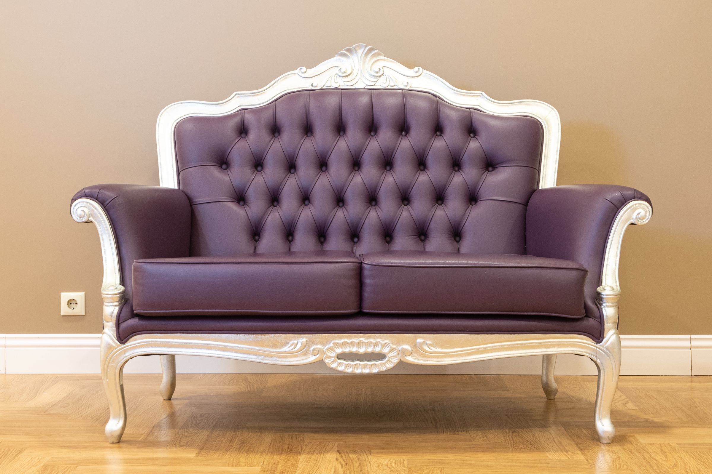 Tufted leather chesterfield, full reupholstery