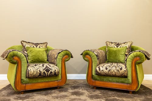 Symmetrical Shot of Two Green Armchairs