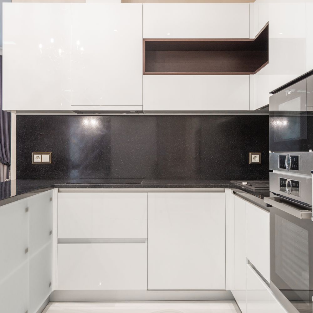 Kitchen Spraying in Leyton — dust sheets down and the room fully protected