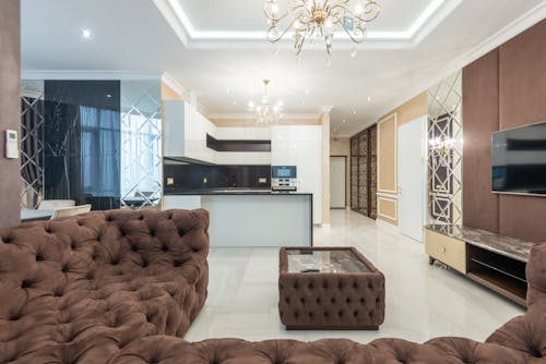 A Brown Couch with Center Table on the Floor