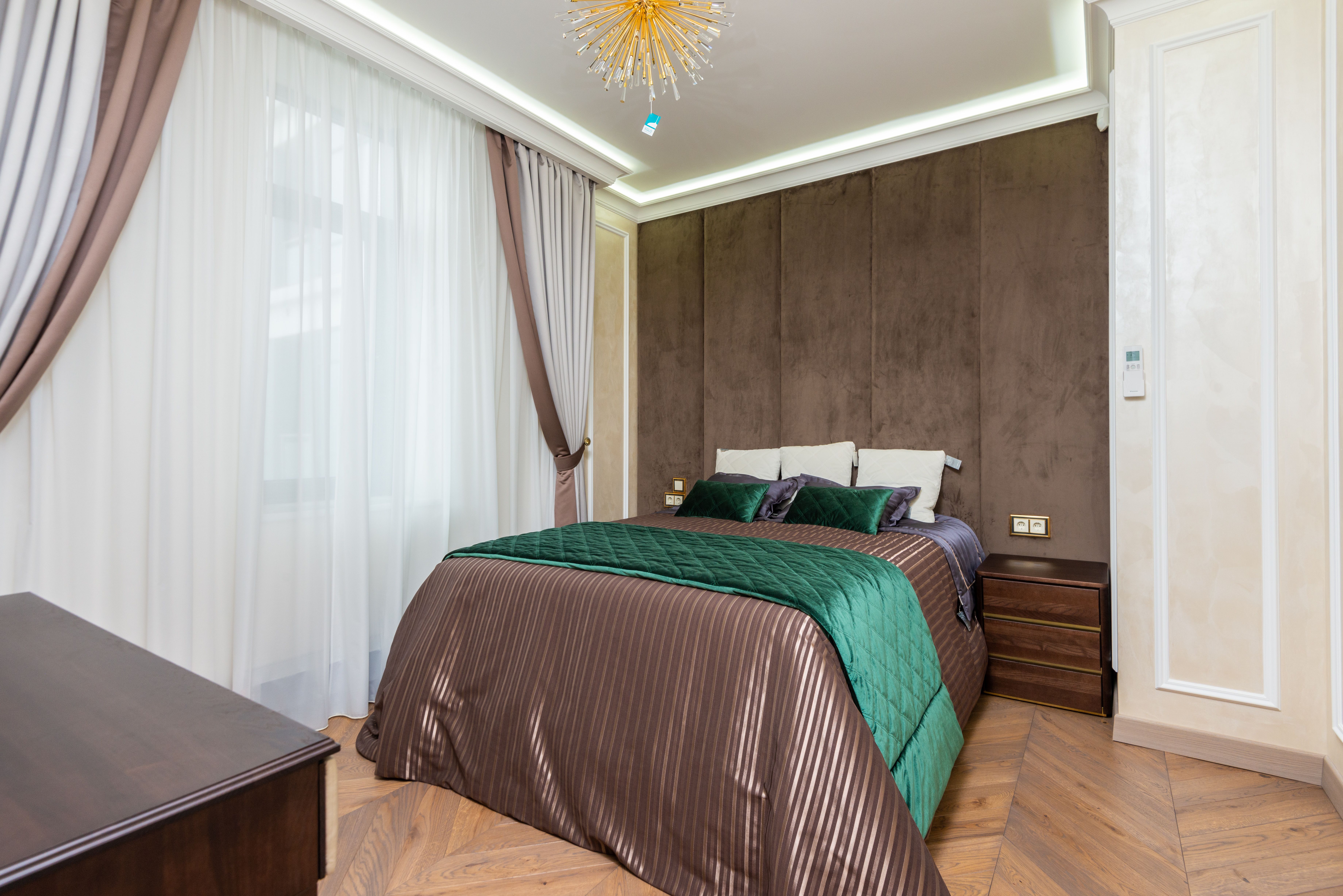 Wallpapering in Widmore — dust sheets down and the room fully protected