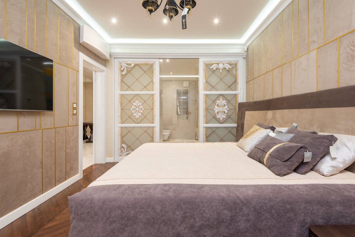 Person relaxing on a modern sofa in a stylish living room with cozy decor