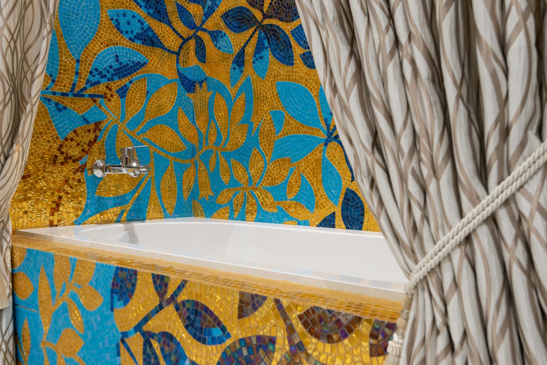 Photo of a Bathroom with Gold and Blue Tiles