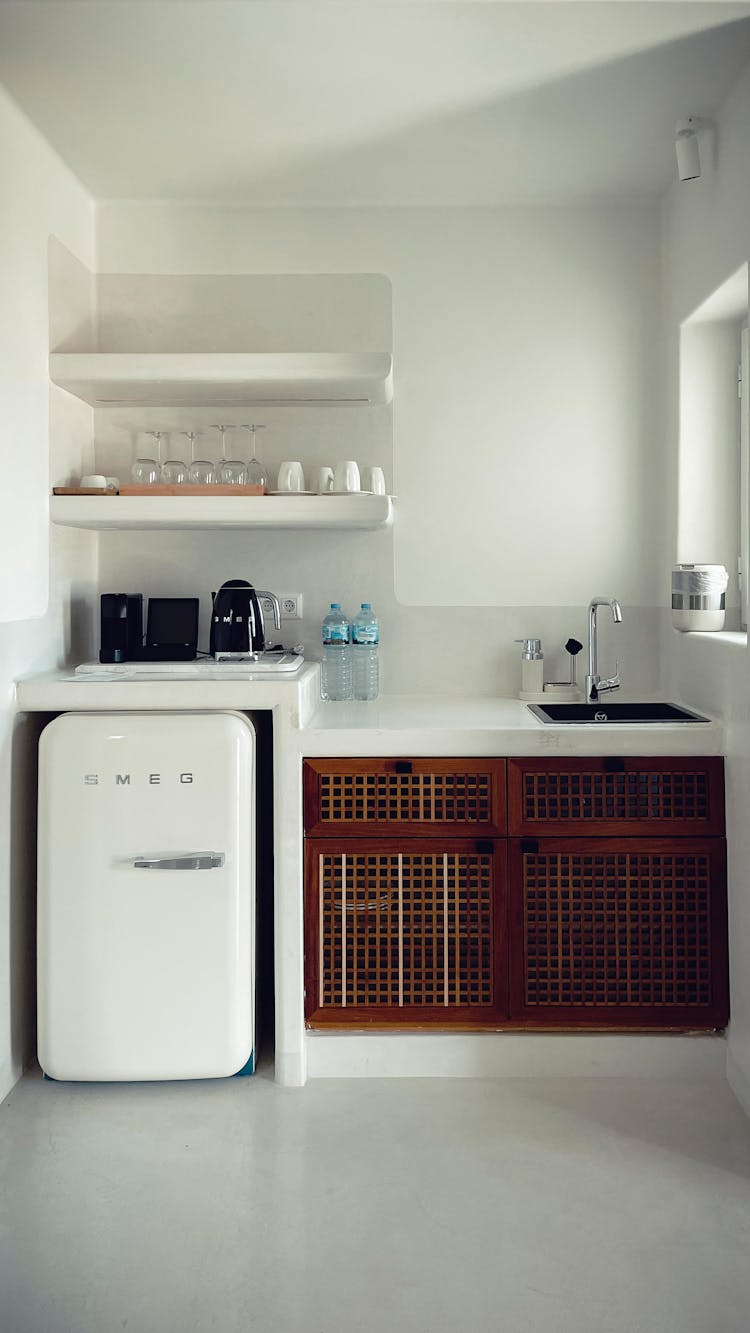 Stylish Kitchen With Sink Shelves And Fridge