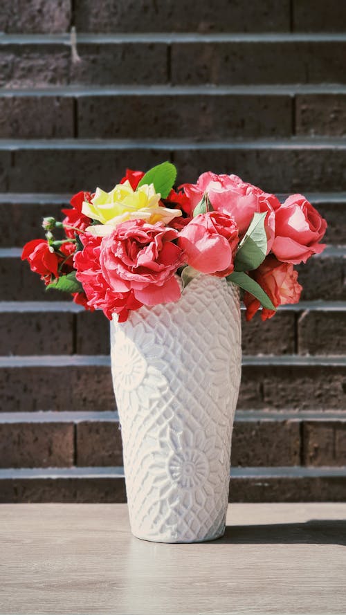 Free Photograph of a White Vase with Pink Roses Stock Photo