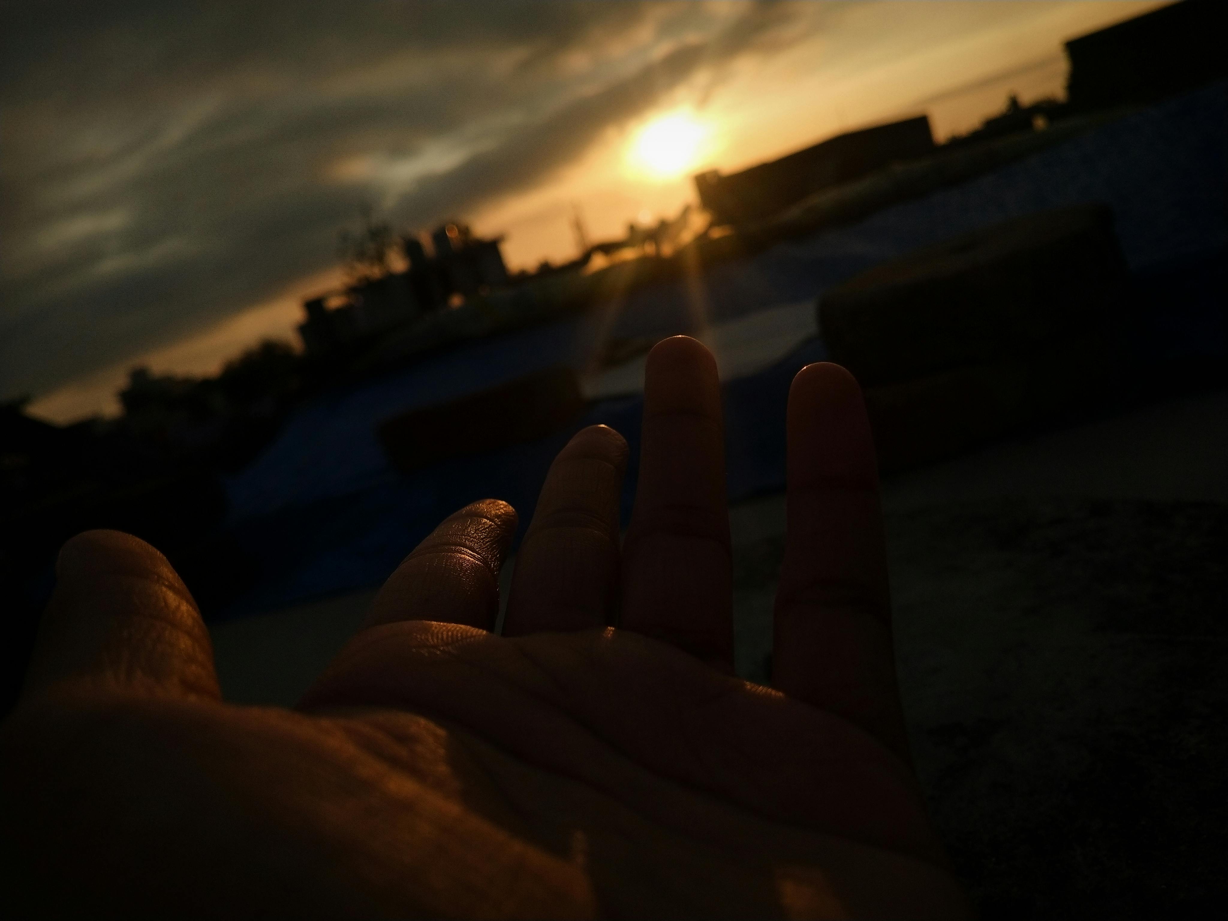 Homeowner checking HVAC air filter as a first step to fix frozen AC coils