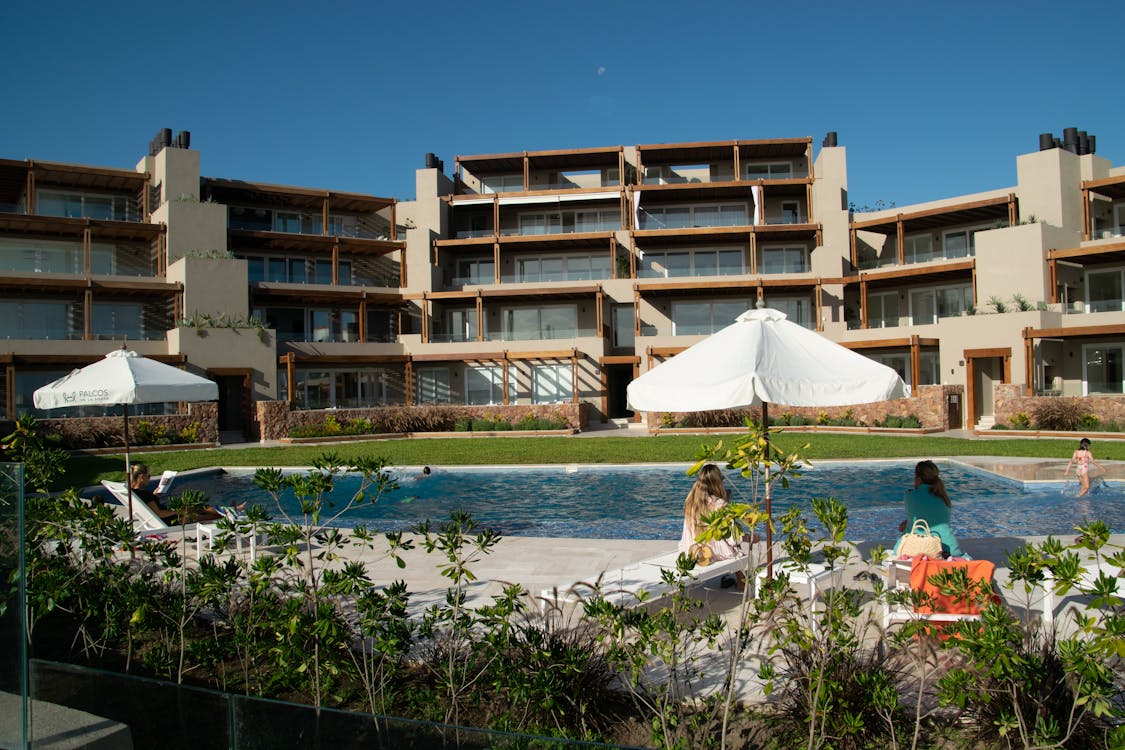 A vibrant logo mat used effectively at a corporate trade show booth to define the space.