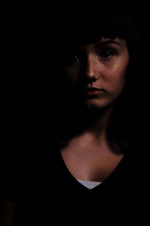 Low-key portrait lit from one side — photo by Gerardo Infante on Pexels