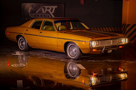 Yellow Car in the Parking Lot