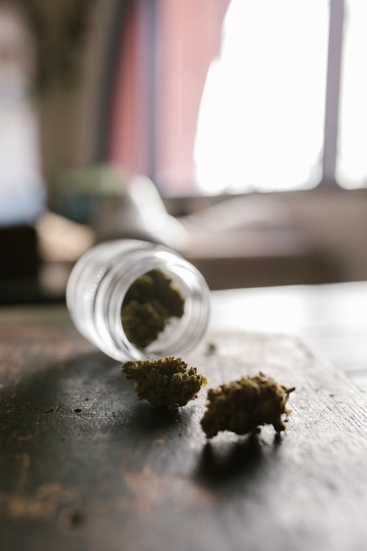 Dried Cannabis In A Glass Jar