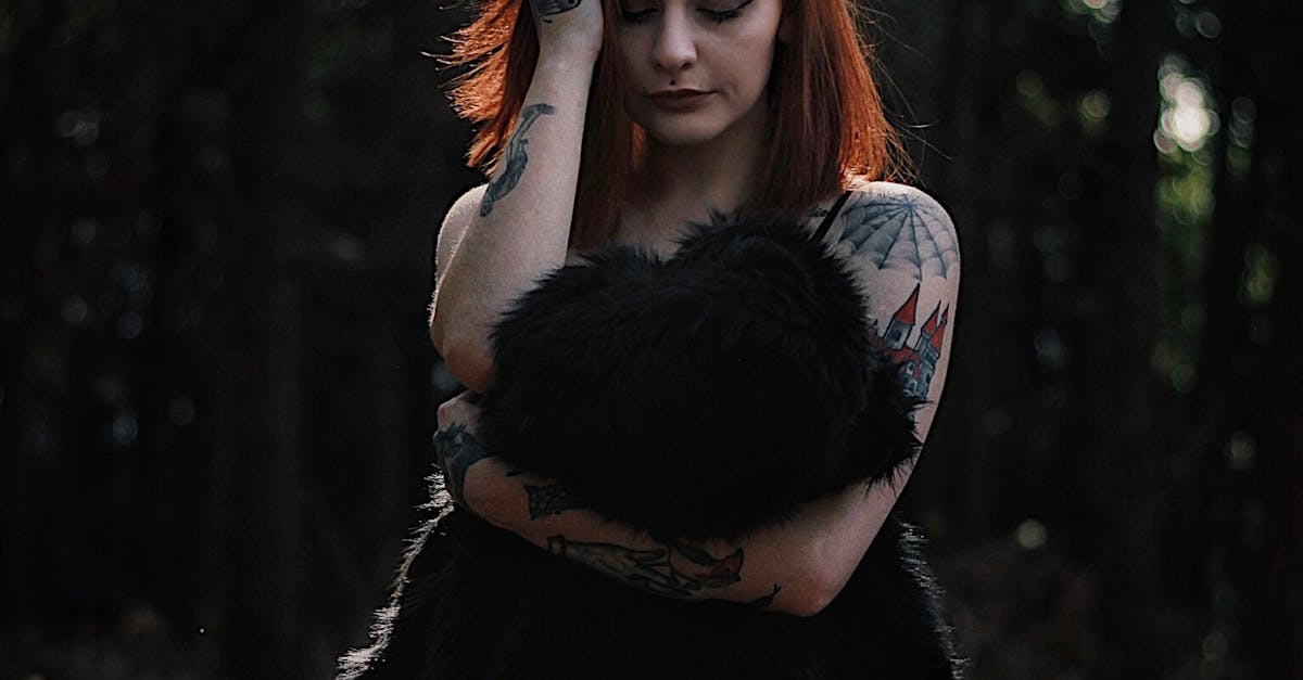 Photography of a Woman Holding Black Fur Coat · Free Stock Photo