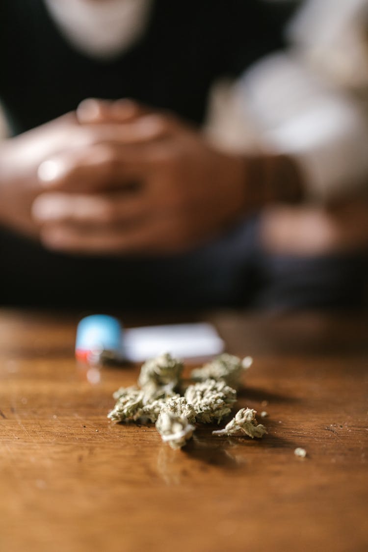 A Marijuana On Wooden Table 