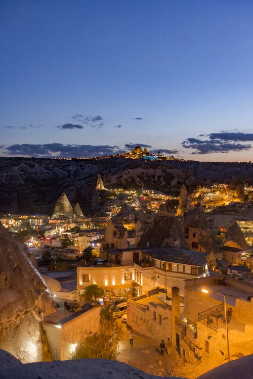 Free A breathtaking view of Cappadocia, Turkey, showcasing illuminated landscapes at twilight, perfect for travel exploration. Stock Photo