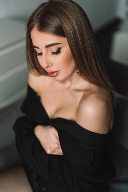 Free Selective Focus of a Woman in Her Black Off Shoulder Top Stock Photo