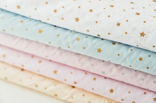 Free Close up of Pastel Fabrics with Star Pattern Stock Photo