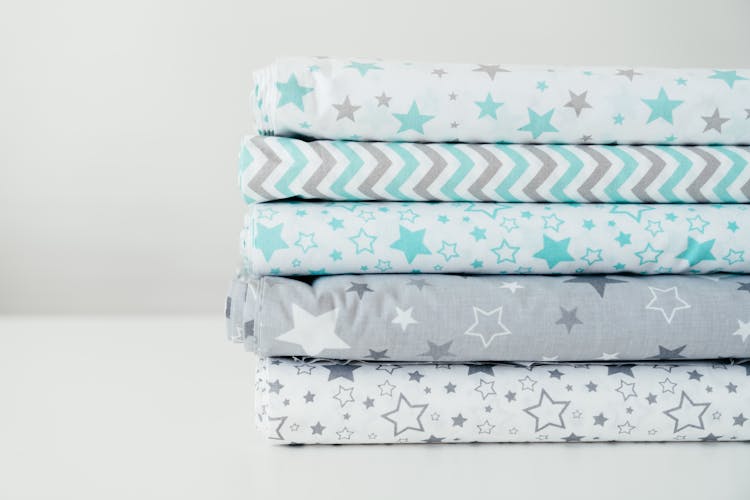 Stack Of Children Fabric Rolls